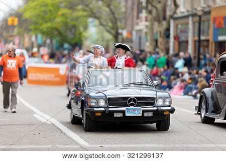 Holland, Michigan, Usa - May 11, 2019: Tulip Time Parade, Man And Woman Wearing Traditional Dutch Cl