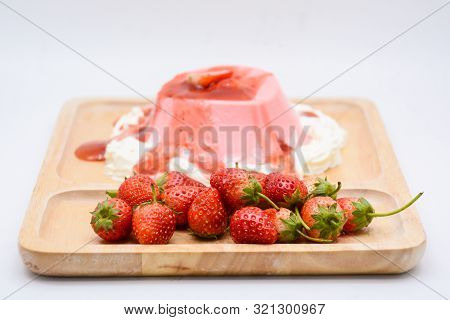 Italian Dessert Pana Cotta With Strawberries And Jam