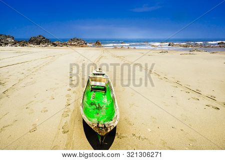 Dugout Canoe On Beach Almejal At The Pacific Coast Next To El Valle In Choco Region Of Colombia
