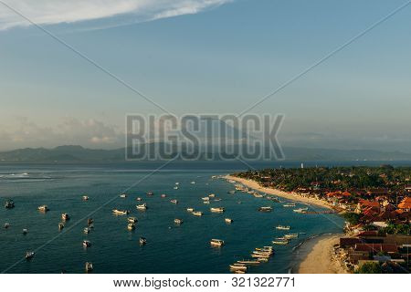 Panoramic View Of The Northern Coast Of The Island Of Lembongan And Jungutbatu Village. Gungung Agun