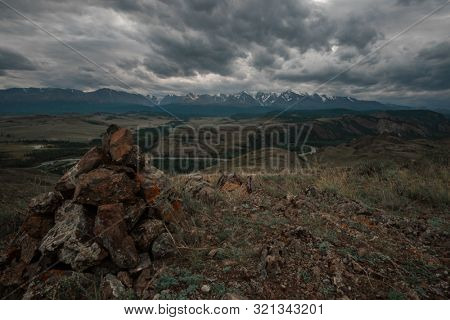 Summer in Kurai steppe and North-Chui ridge of Altai mountains, Russia. Cloud day.