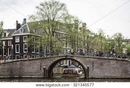 Amsterdam, Holland - July 1, 2017: Amsterdam Is One Of The Most Well Known Bicycle Friendly Cities W