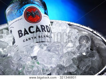 Bottle Of Bacardi Gold Rum In Bucket With Crushed Ice