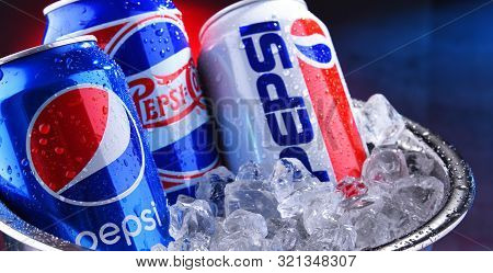 Three Cans Of Pepsi In Bucket With Crushed Ice