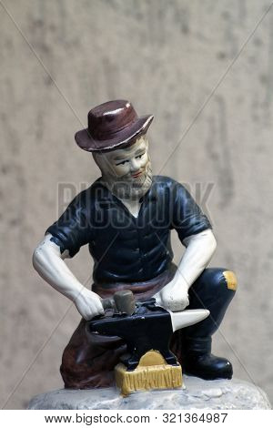 Porcelain Ornament With Blacksmith Motif. Porcelain Small Figurine. Figurine With Blacksmith Figure.