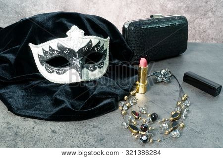 Photo Of Elegant White And Black Venetian, Carnaval Mask Over Dark Background. Vintage Photo