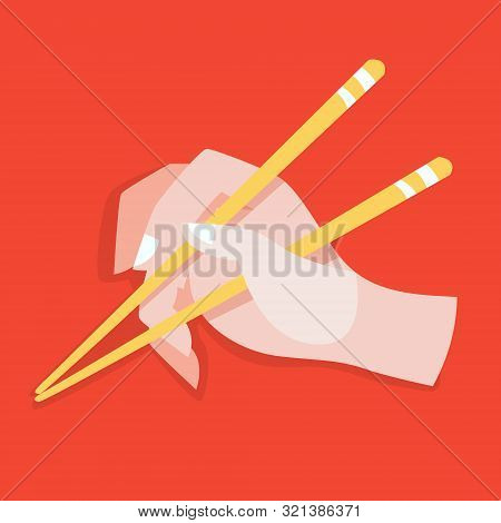 Hand Hold Chinese Or Japanese Chopsticks. Eating Asian Food