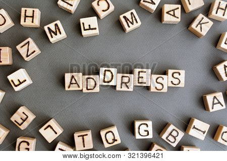 The Word Addres Wooden Cubes With Burnt Letters, Search For A Location Or Postal Address, Gray Backg