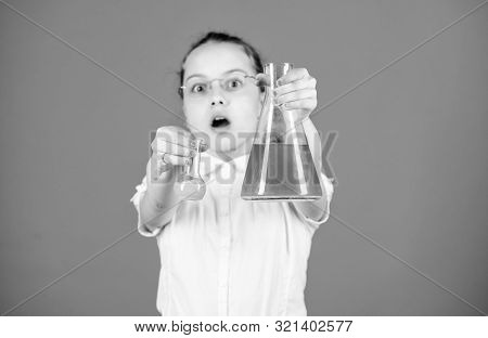Education And Knowledge. Back To School. Child Study Bilogy Lesson. Small Smart Girl With Testing Fl