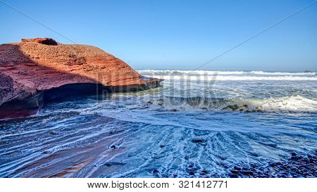 Legzira Beach Is On The Ocean Coast In West Morocco, There Are Beautiful Arches There