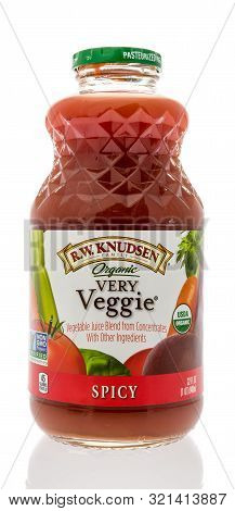 Winneconne, Wi - 10 September 2019: A Bottle Of R W Knudsen Family Very Veggie Spicy Drink On An Iso