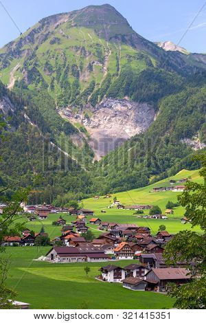 View Of The Traditional Medieval Alpine Village On A Sunny Day. Lungern Switzerland.