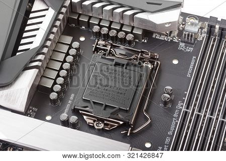 Vrm Zone, Voltage Regulator Module , Cpu Socket With Protector Cap And Memory Sockets On Modern Moth