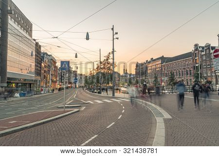 Amsterdam, Netherlands - June 6, 2019: Rokin Street At Sunset Time. Rokin Is Major Street In The Cen