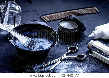 Hair Dye With Brush On Dark Background