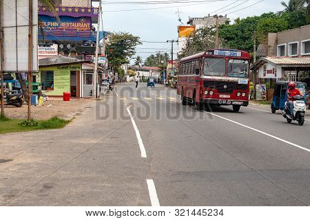 Galle, Sri Lanka - Dec 05, 2018. Local Bus Running On Street In Galle, Sri Lanka. Buses Are The Most