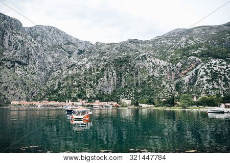 Boats On The Sea Against The Background Of The Natural Landscape In Montenegro.