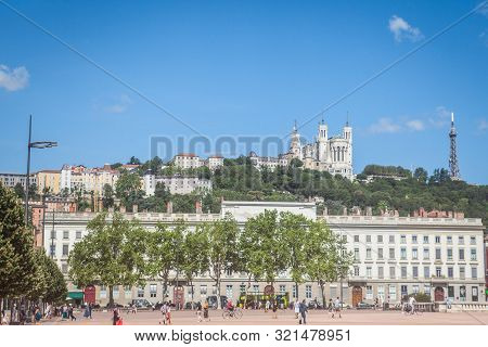 Lyon, France - July 14, 2019:  Basilique Notre Dame De Fourviere Church Seen From The Place Bellecou