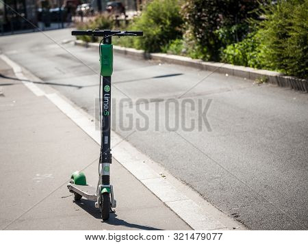 Lyon, France - July 13, 2019: Lime Logo On One Of Their Electric Scooters In Lyon. Lime Is A Transpo