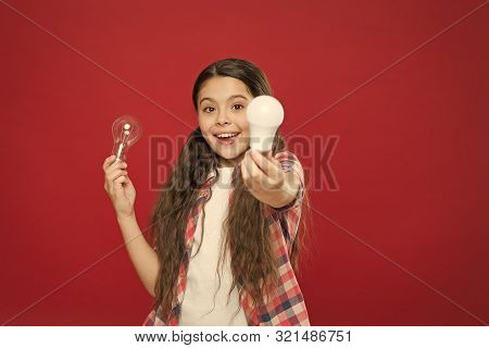 Idea And Brainstorming Concept. Girl Adorable Child With Long Hair Hold Light Bulbs. Idea And Creati