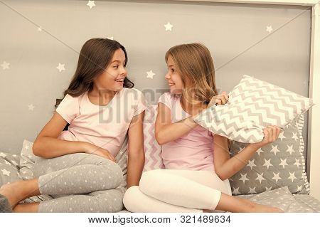 Evening Time For Fun. Sleepover Party Ideas. Girls Happy Best Friends Or Siblings In Cute Stylish Pa