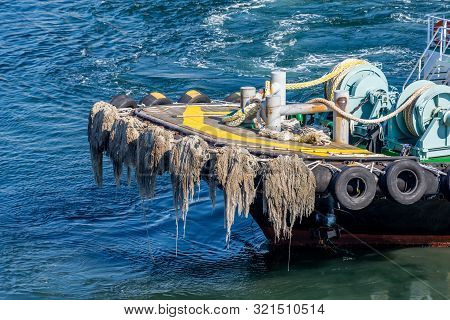 The Small Tug Vessel In The Sea
