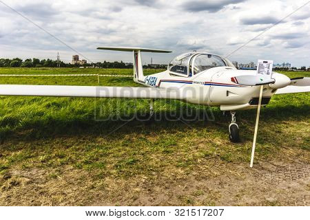 KALININGRAD, Russia - August 18, 2019: 100 Anniversary First European Airport Devau Fest, Ultra Light Propeller Screw Plane Ready for Flight