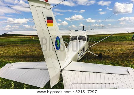 KALININGRAD, Russia - August 18, 2019: 100 Anniversary First European Airport Devau Fest, Ultra Light Propeller Screw Plane Ready for Flight
