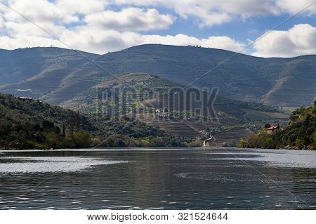 Scenic View Of The Douro River And Valley With Terraced Vineyards Near The Pinhao Village, In Portug