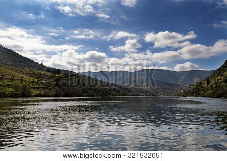 Scenic View Of The Douro River And Valley With Terraced Vineyards Near The Pinhao Village, In Portug