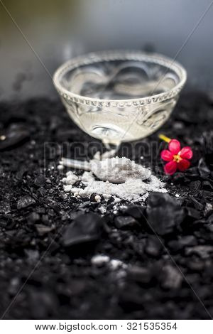 Activated Charcoal Well Mixed With Baking Soda To Detoxify Strands And Scalp, Restore Shine, Repair