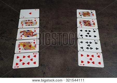 9 09 2019 Tallinn, Estonia: The Combination Of Flash Royal Cards On A Gray Table With Money And Gold