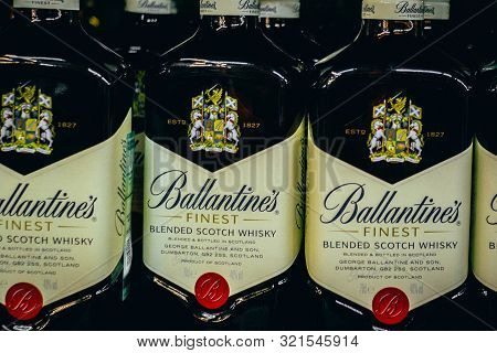 Tyumen, Russia-avg 25, 2019: Products Of Hypermarket Sale Ballantines Whisky Beverages In The Store 