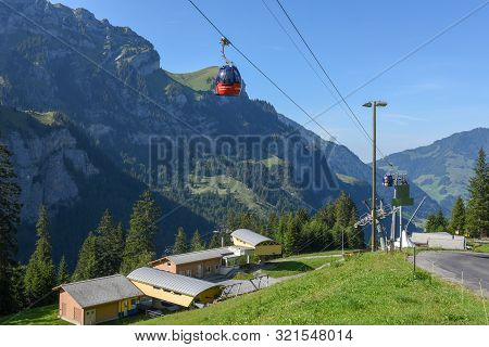 Cableway At Melchtal On The Swiss Alps