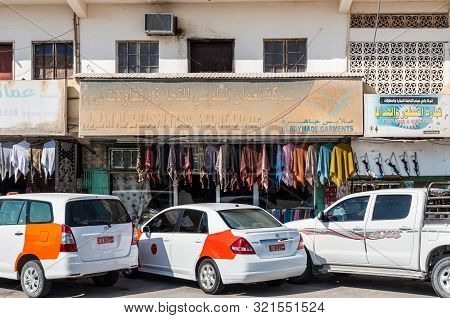 Salalah, Oman - November 12, 2017: Street View Of Salalah City At Day With Parked Cars Near Tourist 