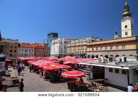 Zagreb, Croatia - June 30, 2019: People Visit Dolac Market Place In Zagreb, Capital City Of Croatia.