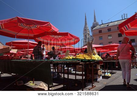Zagreb, Croatia - June 30, 2019: People Visit Dolac Market Place In Zagreb, Capital City Of Croatia.