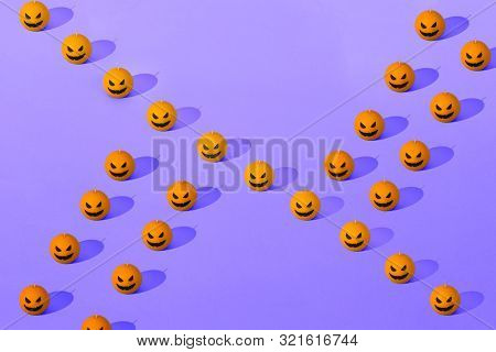 Halloween Orange And Violet Seamless Pattern. Orange Candle Pumpkins. Jack Olantern. Many Orange Pum