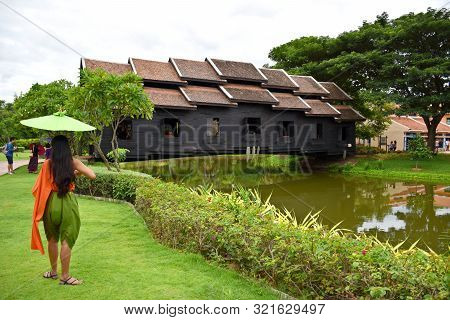 Kanchanaburi, Thailand, 09.09.2019: Beautiful Garden, Lake, Traditional Thai, Siamese Clothes, Build