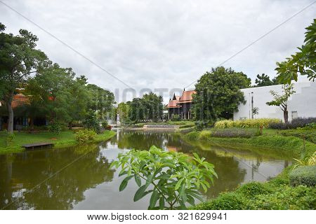 Kanchanaburi, Thailand, 09.09.2019: Beautiful Garden, Lake, Traditional Thai, Siamese Clothes, Build