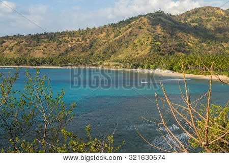 Beautiful landscape of Senggigi beach, Lombok island, scenic travel destination beach with crystal blue waters, Indonesia