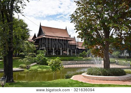 Kanchanaburi, Thailand, 09.09.2019: Beautiful Garden, Lake, Traditional Thai, Siamese Clothes, Build
