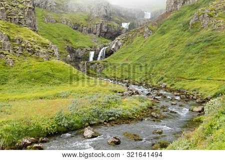 Klifbrekkufossar Falls In Summer Season View, Iceland. Icelandic Landscape.