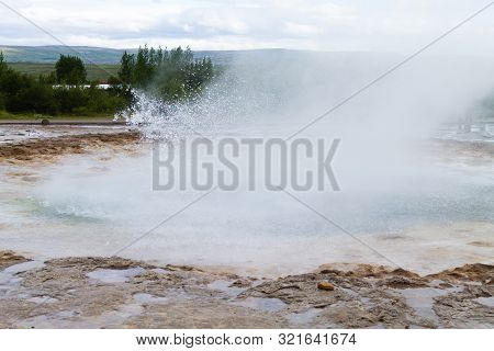 Strokkur Geothermal Area. Strokkur Geyser Eruption, Iceland