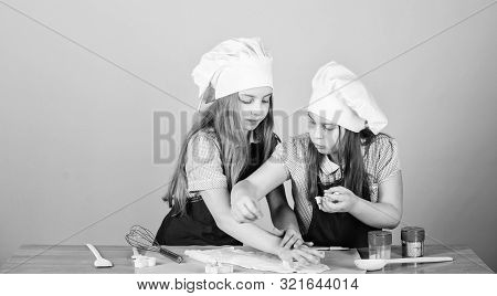 They Like Cooking. Adorable Little Girls Enjoy Cooking Together. Small Children Taking Cooking Class