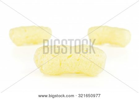 Group Of Three Whole Salted Yellow Corn Puff Isolated On White Background