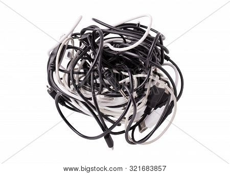 Black And White Wires Tangled Together. Tangle Of Tangled Wires Usb And Micro Usb, Audio Cable Jack.