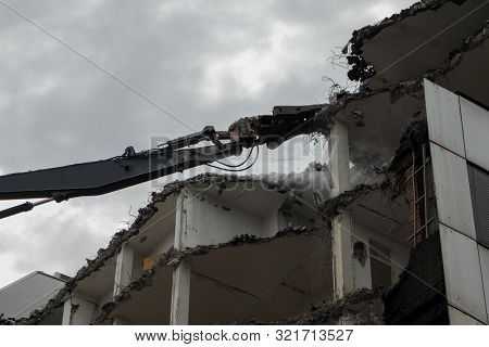 Demolition Pulveriser Demoliting Building In The City