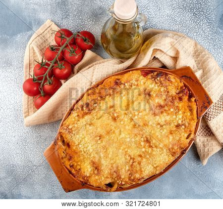 Traditional Italian Cannelloni With Vegetables, Minced Meat And Cheese. On A Wooden Background. Top 