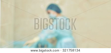Ophthalmology Laser Microscope Operation. Clinic Room With Doctor And Parient. Blur Background. Unfo